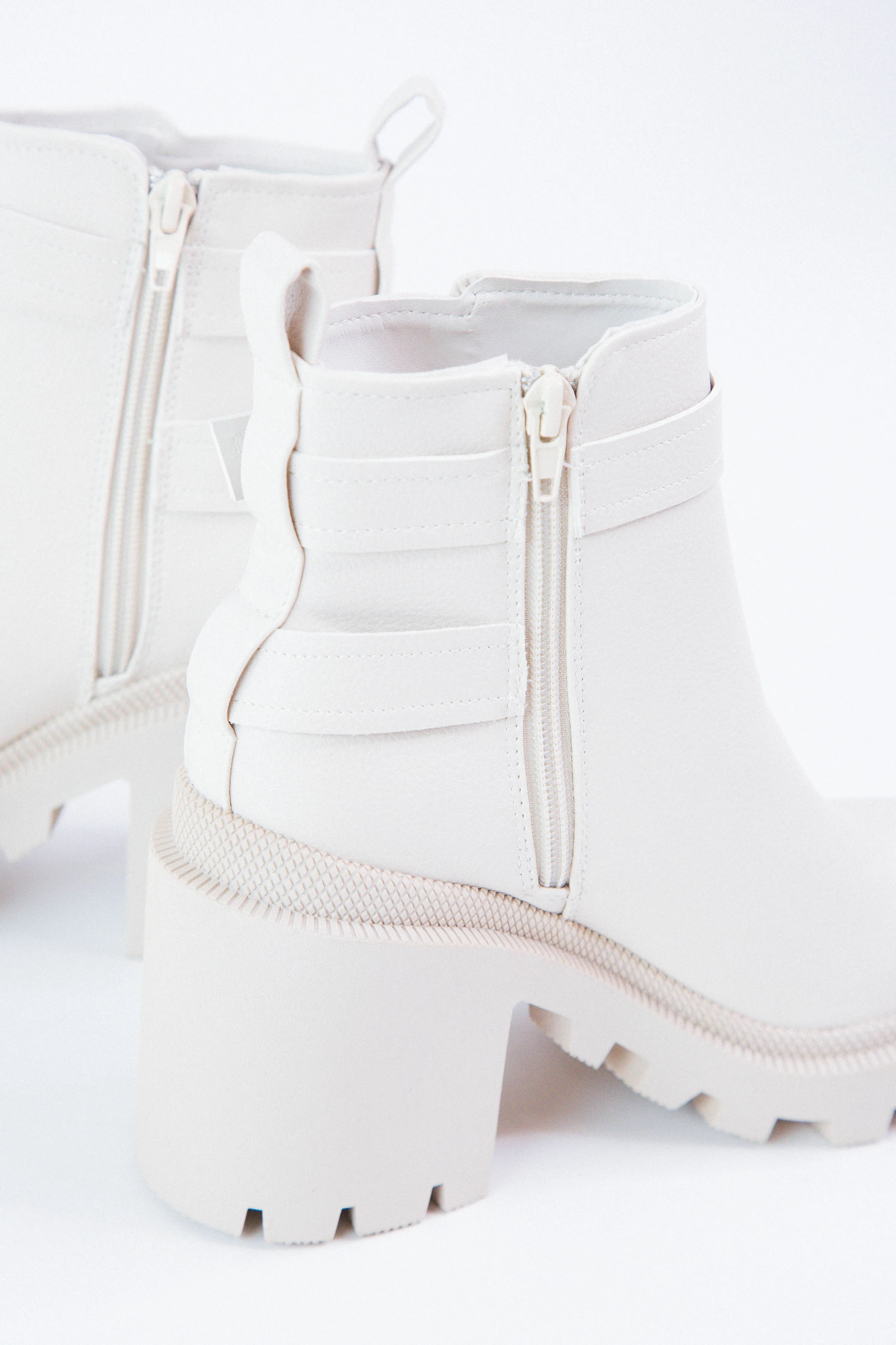 Ivory Pebble Maze Buckle Strap Chunky Bootie